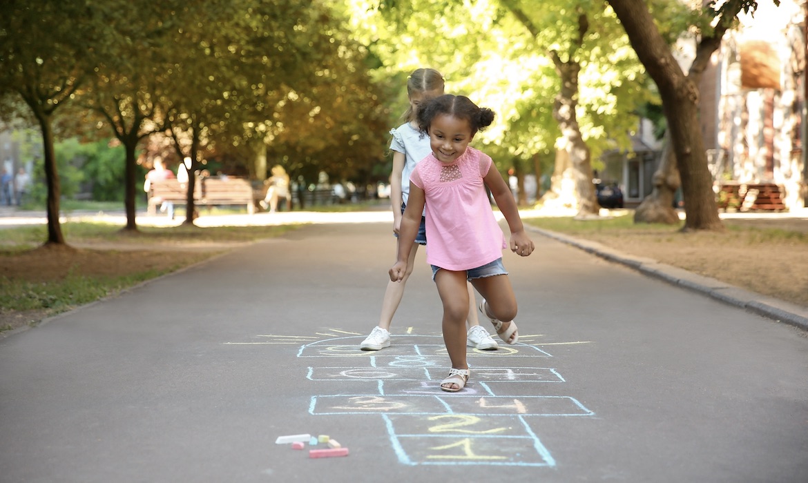 Kids Playing Hopscotch